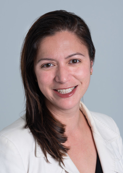 Head and shoulders portrait photo of Meg Poutasi